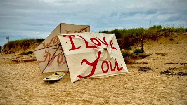 Beach umbrellas printed with I Love You