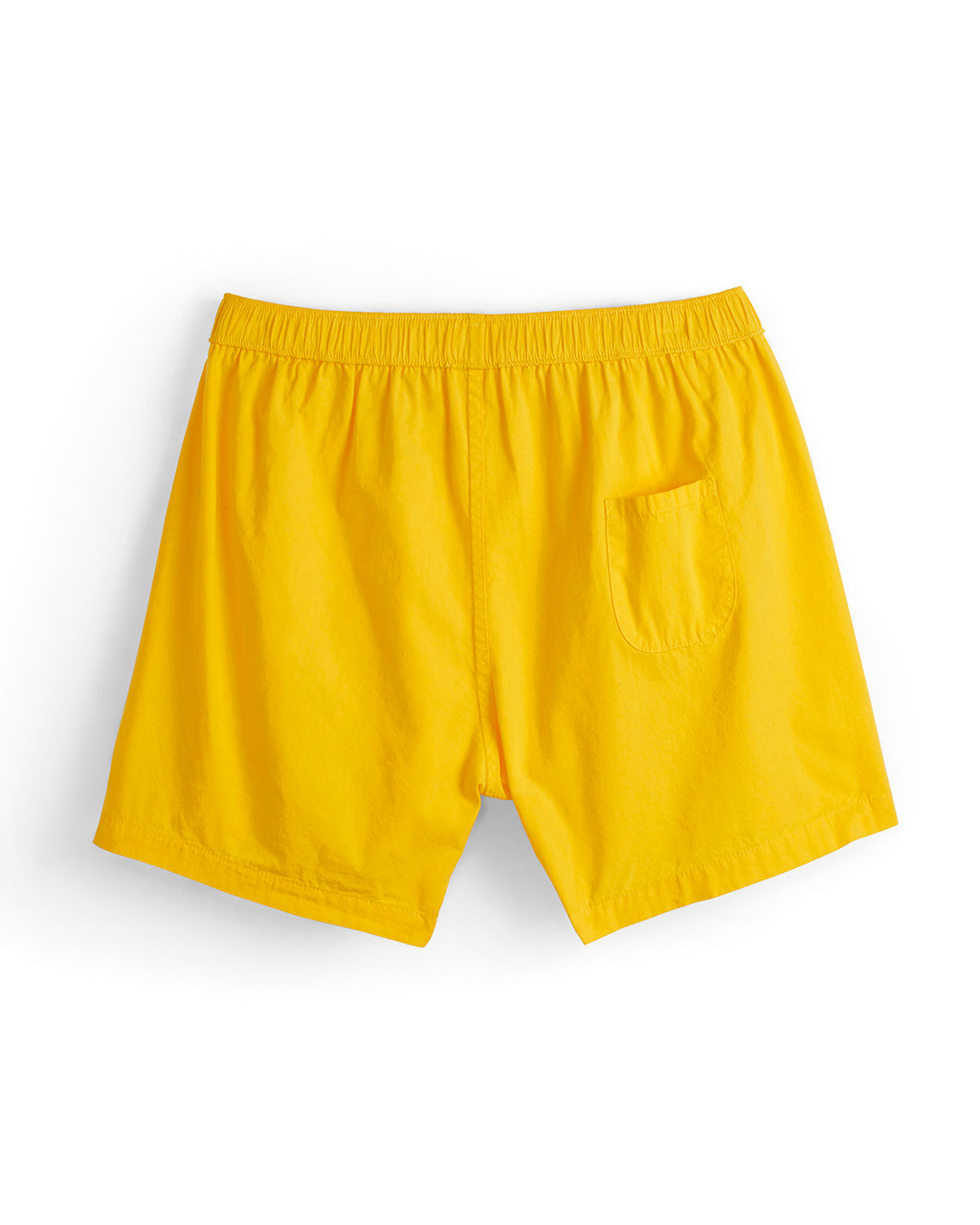 Back view of Yellow shorts on a white background