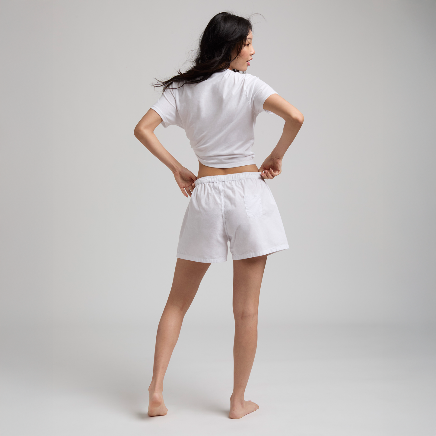 color_White - Model with back to camera wearing The Bye Boxer in white